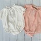 Calamaro peach and white linen rompers.