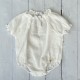 Calamaro peach and white linen rompers.